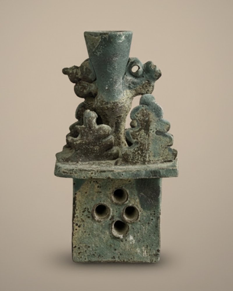 The same stoneware candle holder restyled on a clean neutral background